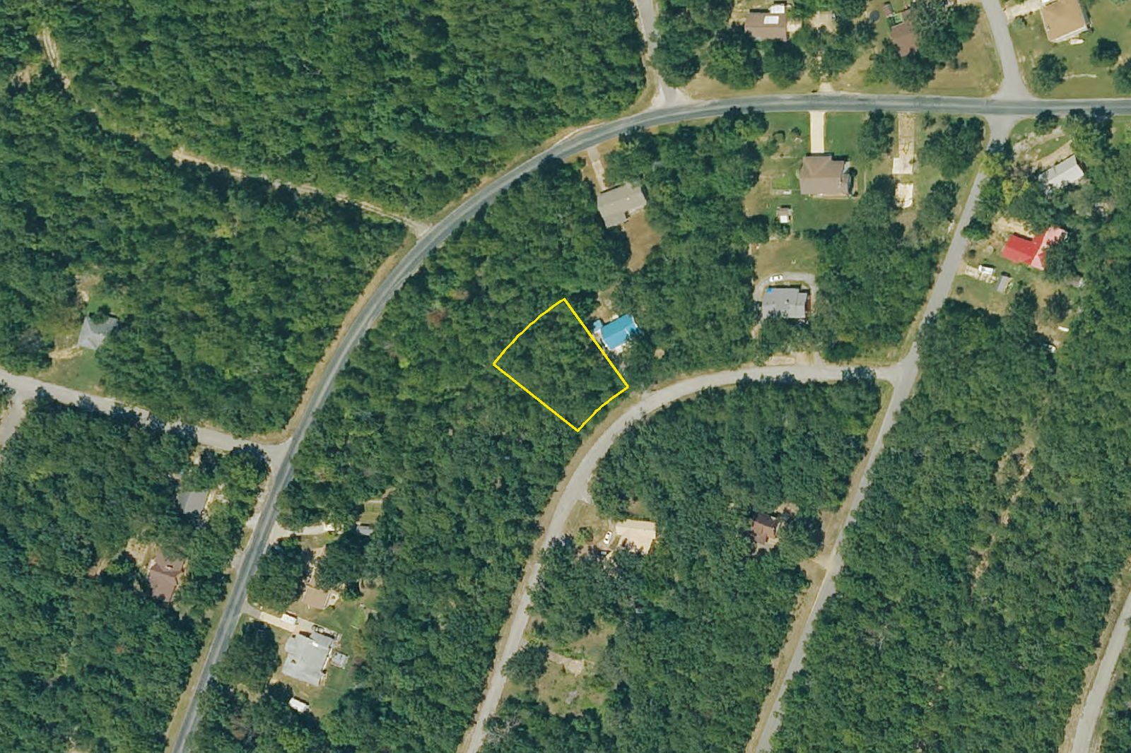 Aerial close-up of the 0.35-acre parcel with boundary outline