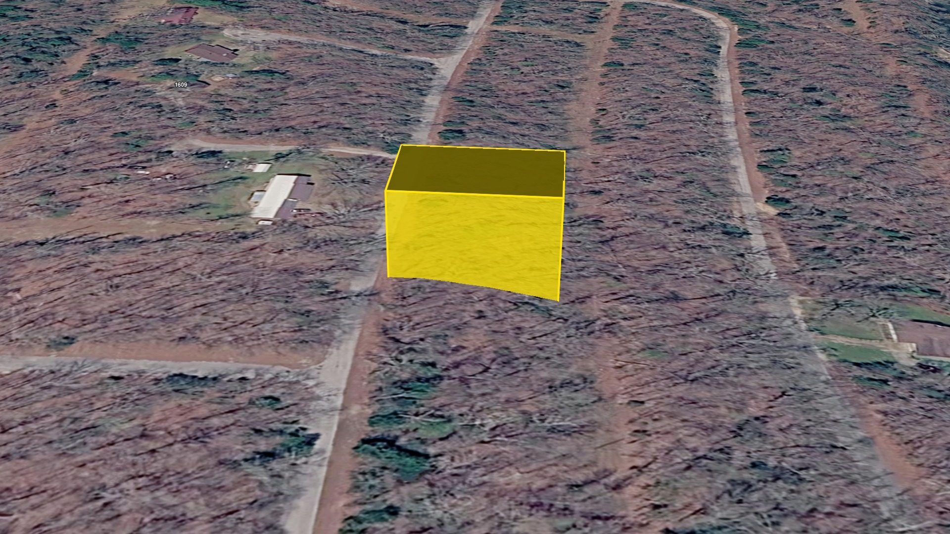3D aerial view of Lot 29 with the parcel boundary raised above the terrain, looking west toward the neighborhood
