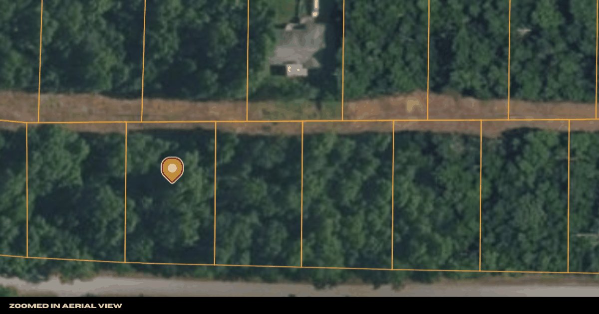 Aerial view with a pin marking Lot 32 within the Spring Addition block