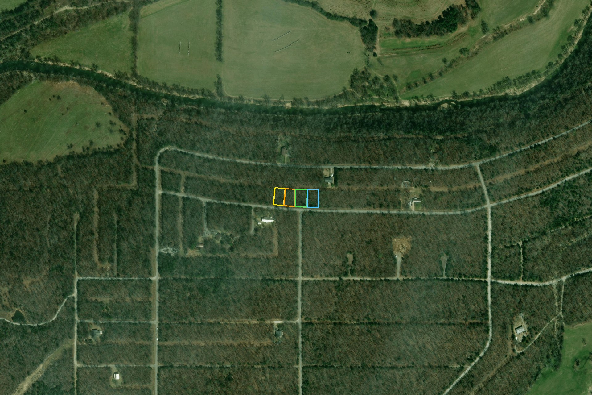 Aerial context showing all four lots in the block with surrounding streets and neighborhood